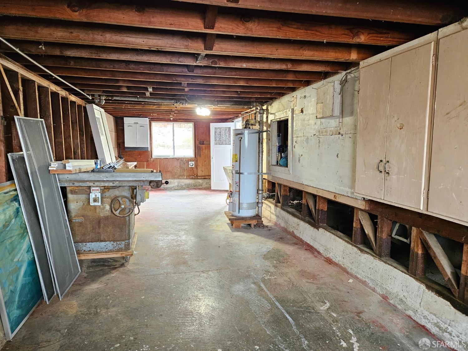 193 Hillside Boulevard Daly City, CA 94014 - Photo 18 of 20 a view of a porch with furniture and a garage