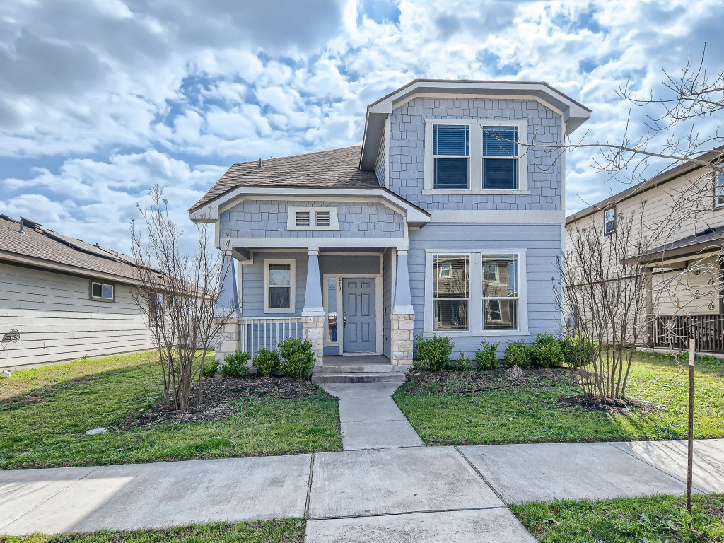 413 Cane River Road Pflugerville, TX 78660 - Photo 1 of 1 a front view of a house with garden