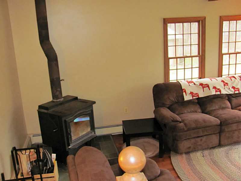 865 Lapham Farm Road Burrillville, RI 02839 - Photo 8 of 21 Den/Family/Great Room. Wood stove, cathedral ceiling large slider to deck.