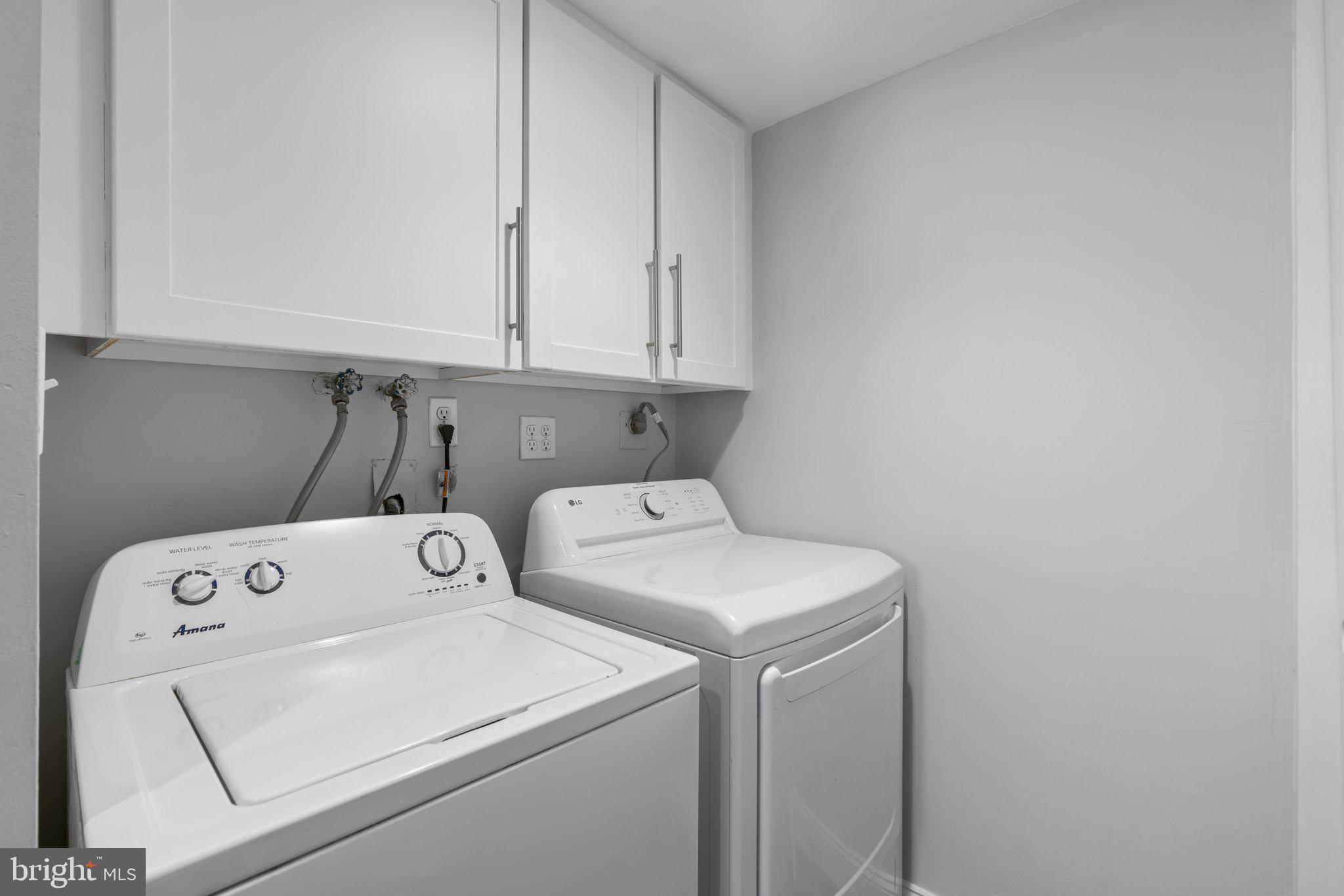 8583 Seasons Way Lanham, MD 20706 - Photo 8 of 25 a utility room with dryer and washer