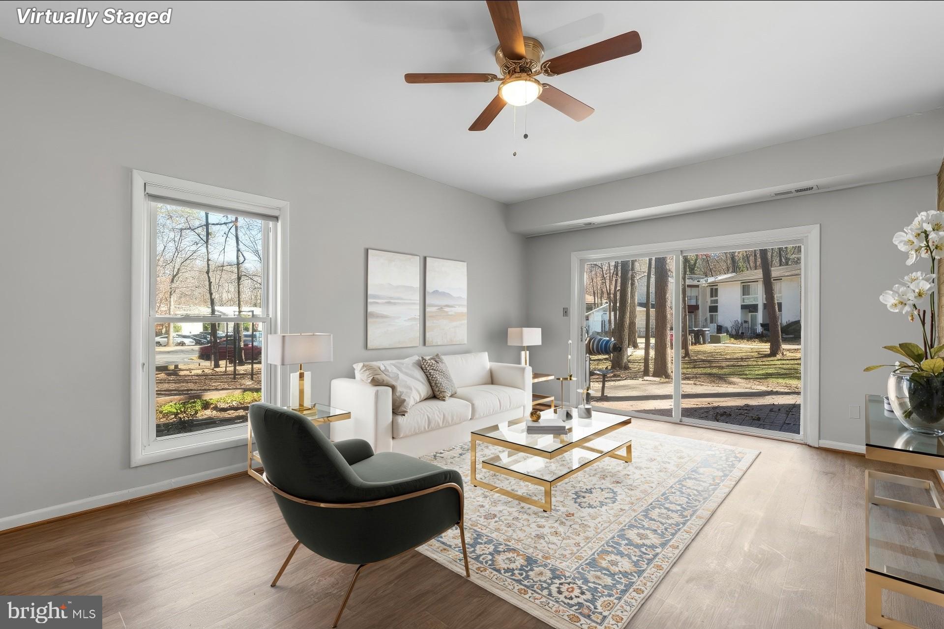 8583 Seasons Way Lanham, MD 20706 - Photo 9 of 25 a living room with furniture and a large window