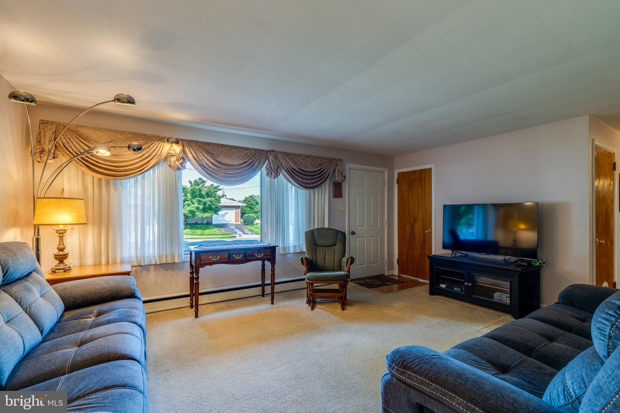 600 Kissel Hill Road Lititz, PA 17543 - Photo 13 of 30 a living room with furniture and a flat screen tv