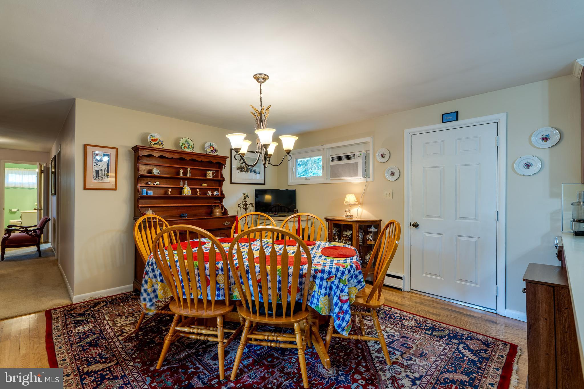 600 Kissel Hill Road Lititz, PA 17543 - Photo 18 of 30 a view of a dining room with furniture and chandelier