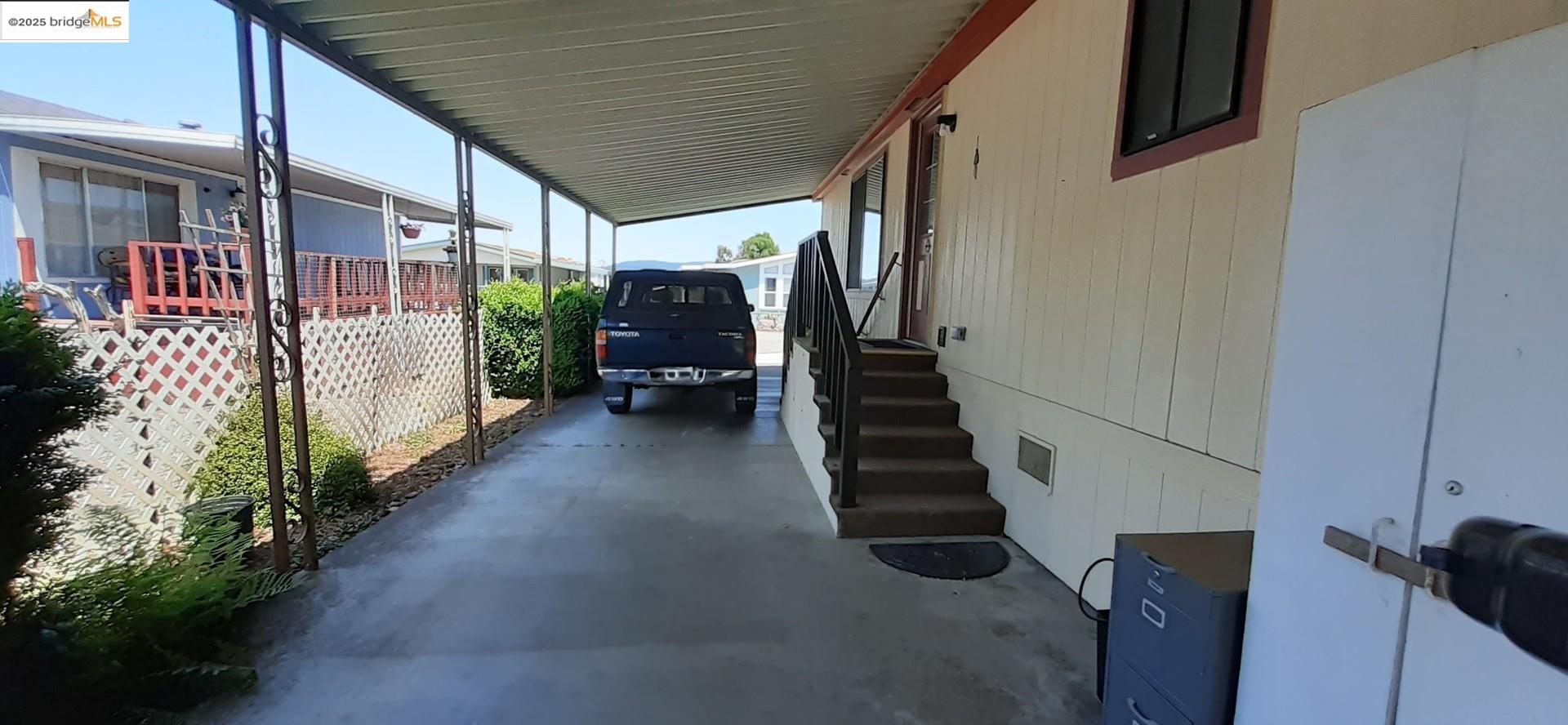 136 Castle Court Fortuna, CA 95540 - Photo 15 of 31 a view of a porch with wooden floor and stairs