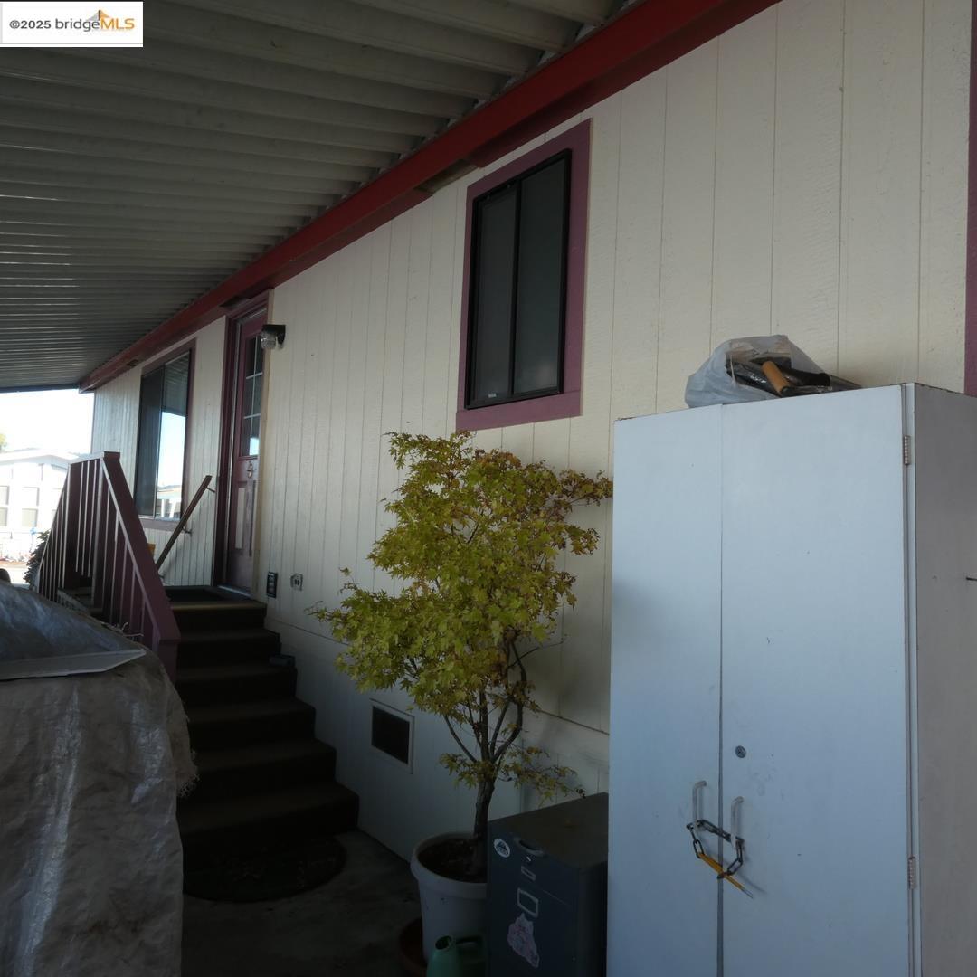 136 Castle Court Fortuna, CA 95540 - Photo 16 of 31 a living room with furniture and a potted plant