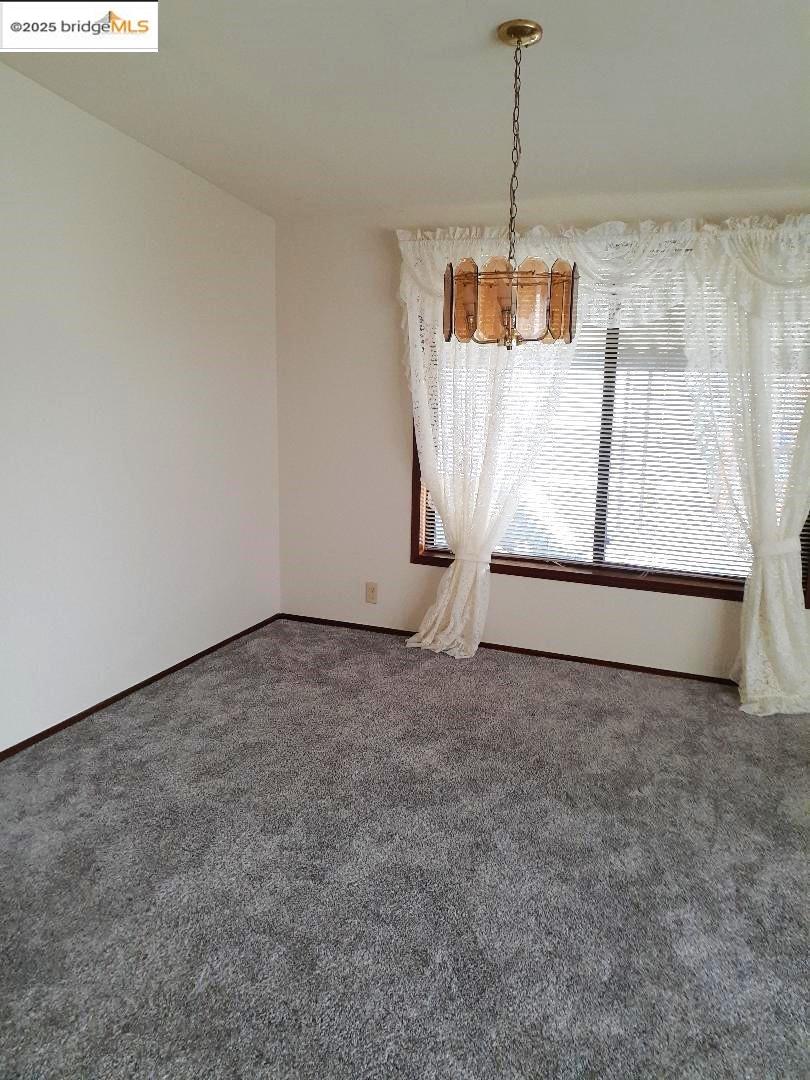136 Castle Court Fortuna, CA 95540 - Photo 2 of 31 a view of a room with wooden floor and window