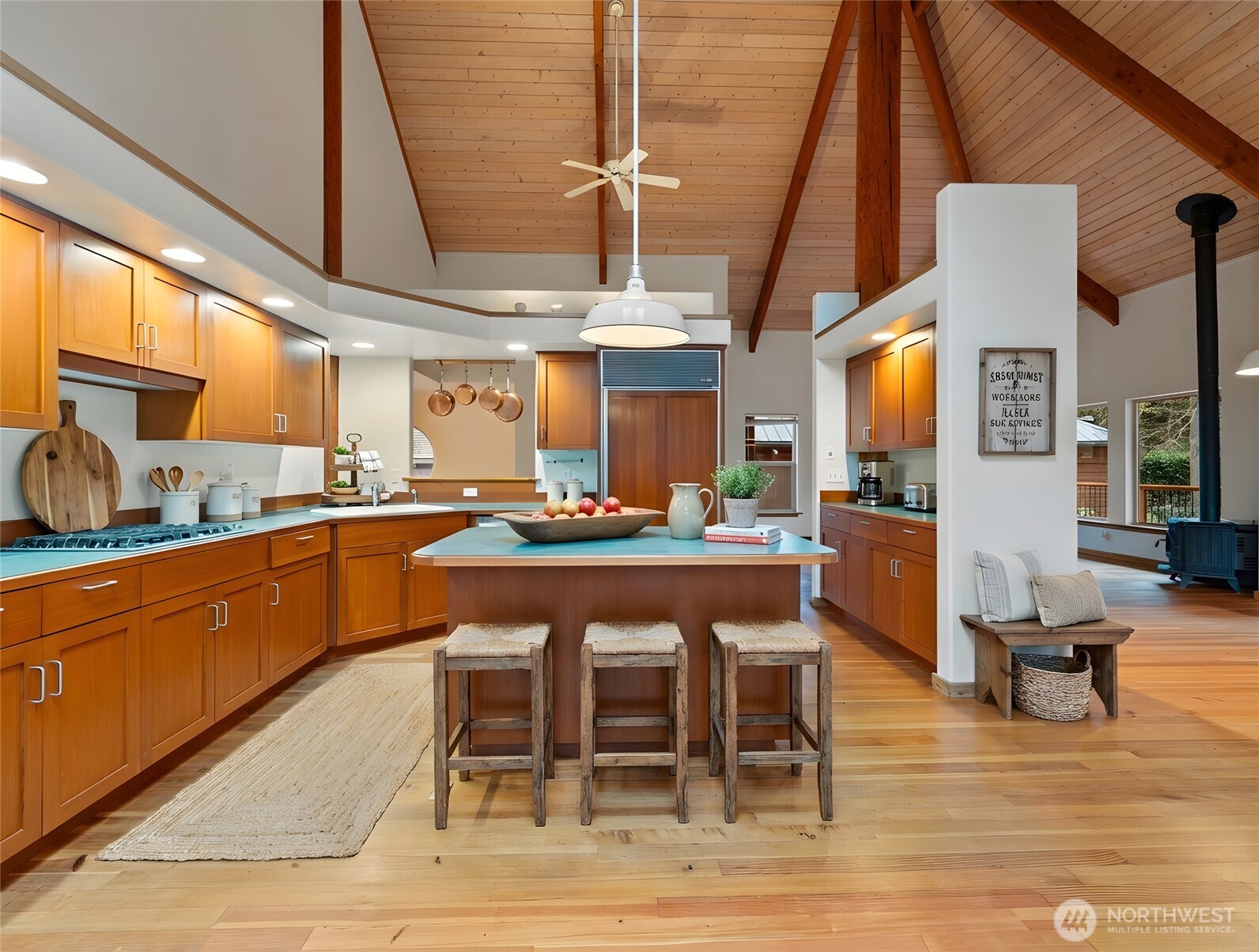 2204 41st Street Anacortes, WA 98221 - Photo 13 of 37 a room with stainless steel appliances kitchen island granite countertop furniture and a kitchen view