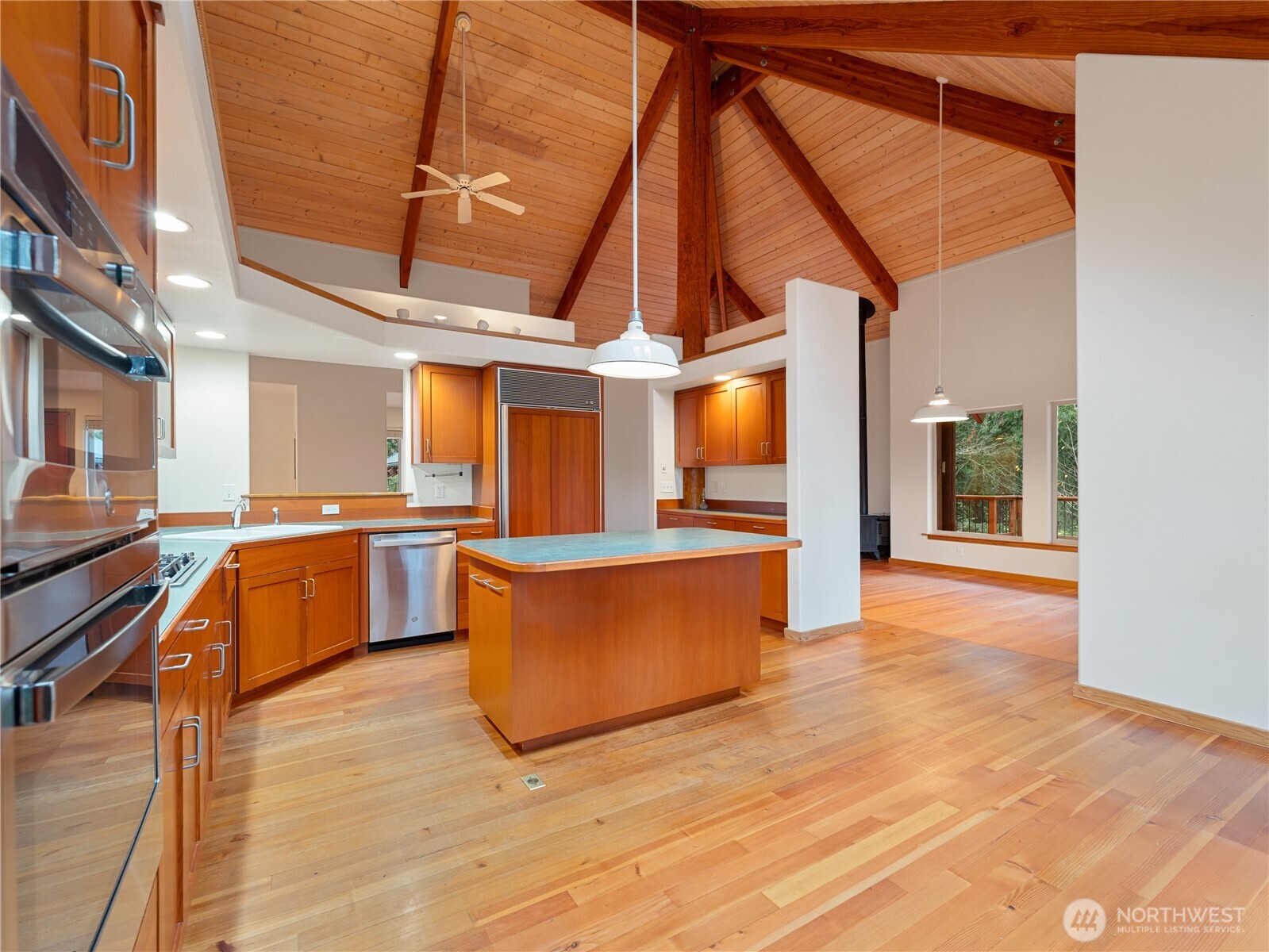 2204 41st Street Anacortes, WA 98221 - Photo 14 of 37 a view of a kitchen with wooden floor