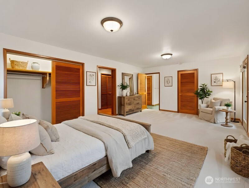 2204 41st Street Anacortes, WA 98221 - Photo 15 of 37 a bedroom with a bed and a couch