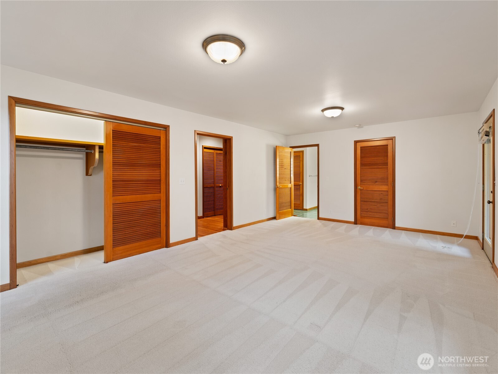 2204 41st Street Anacortes, WA 98221 - Photo 16 of 37 a view of an empty room with closet and bathroom