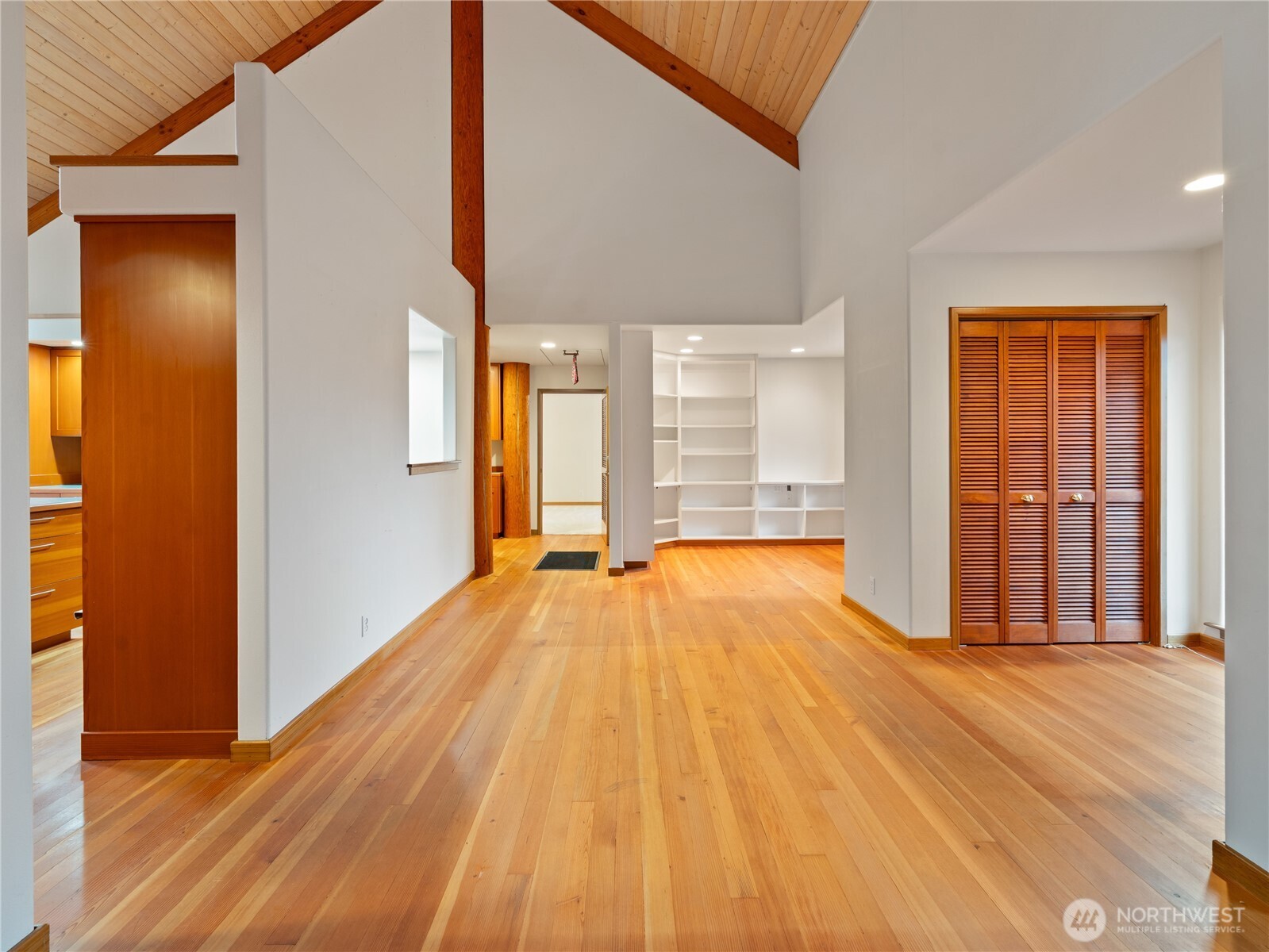2204 41st Street Anacortes, WA 98221 - Photo 6 of 37 a view of a room with wooden floor and windows