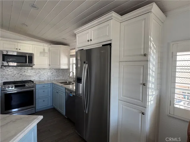 a view of hallway with wooden floor