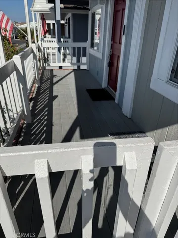 a view of living room kitchen and entryway