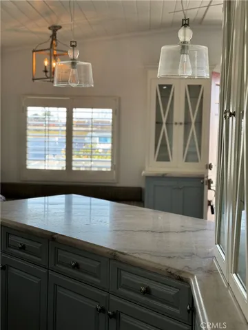 a bathroom with a shower and a sink