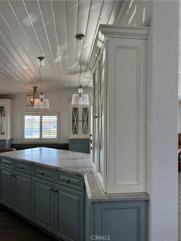 a view of a sink and a window