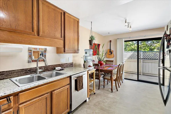 a kitchen that has a cabinets counter space and appliances
