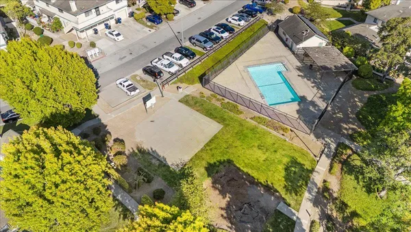 a view of swimming pool with a yard
