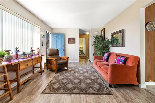 a living room with furniture and a couch