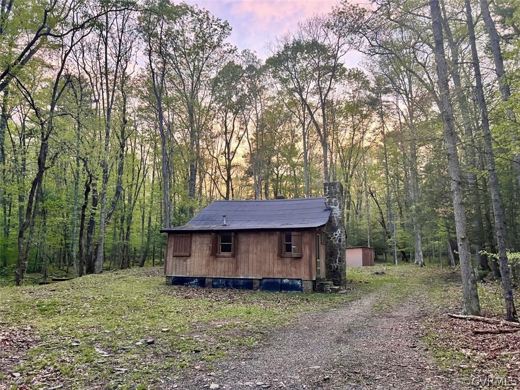 1300 Braley Pond Road West Augusta, VA 24485 - Photo 1 of 23 a view of a small house with a trees