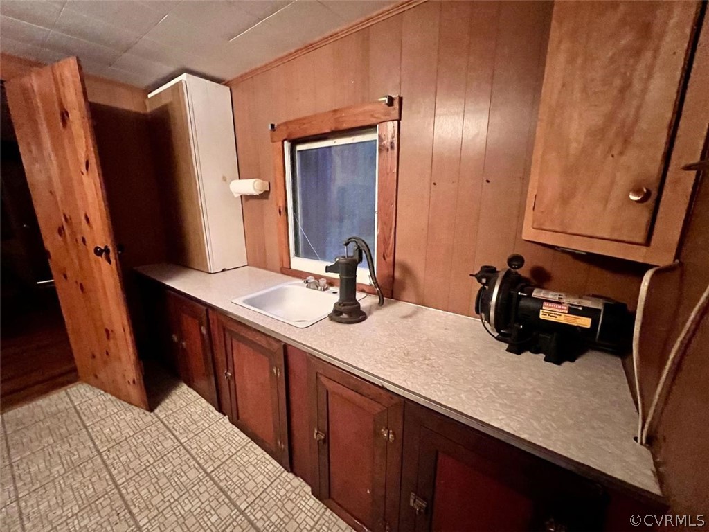 1300 Braley Pond Road West Augusta, VA 24485 - Photo 15 of 23 a bathroom with a sink a double vanity and mirror