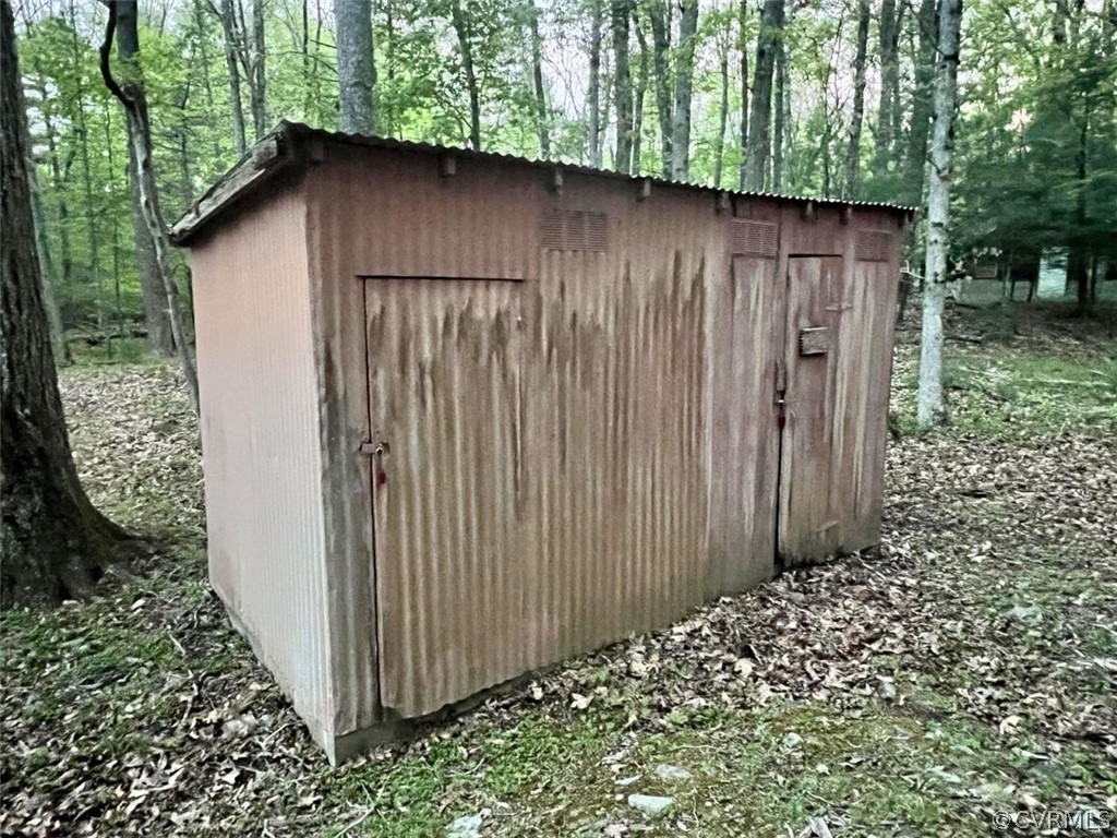 1300 Braley Pond Road West Augusta, VA 24485 - Photo 21 of 23 a wooden door in front of a house with wooden fence