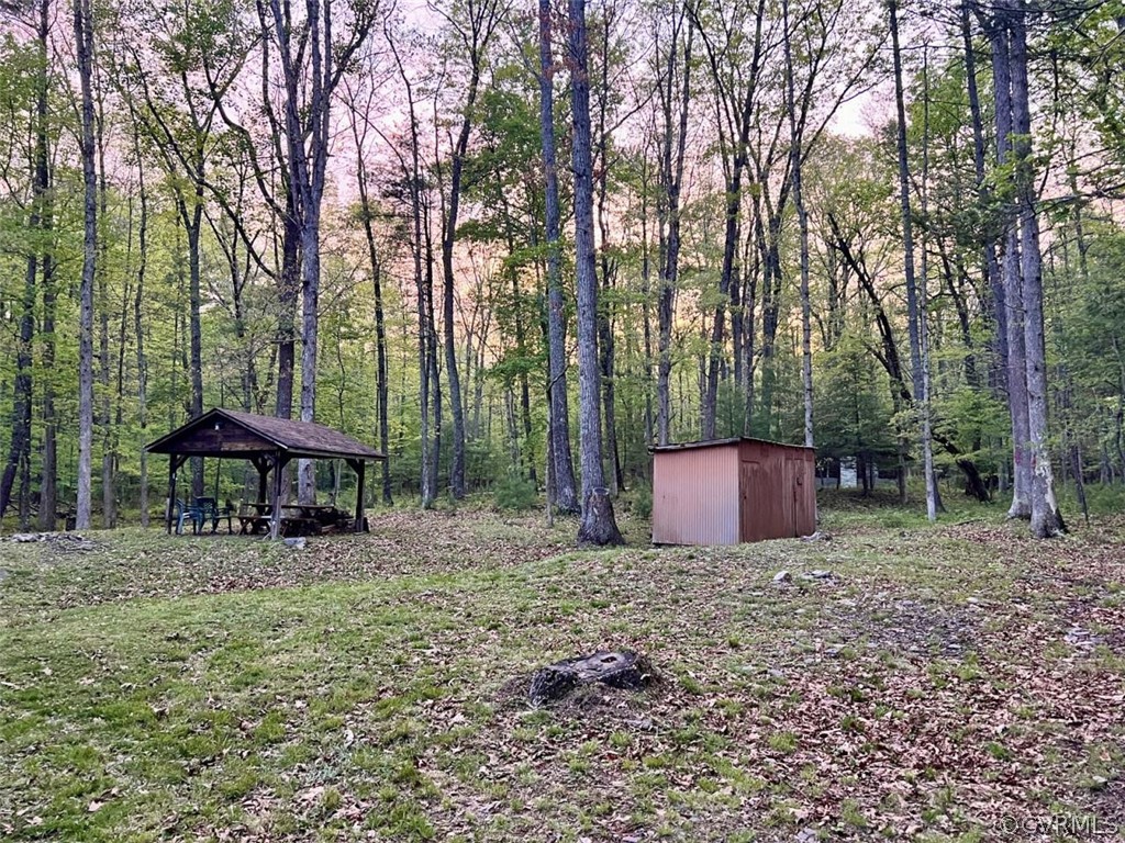 1300 Braley Pond Road West Augusta, VA 24485 - Photo 4 of 23 a wooden fence with some trees in the background