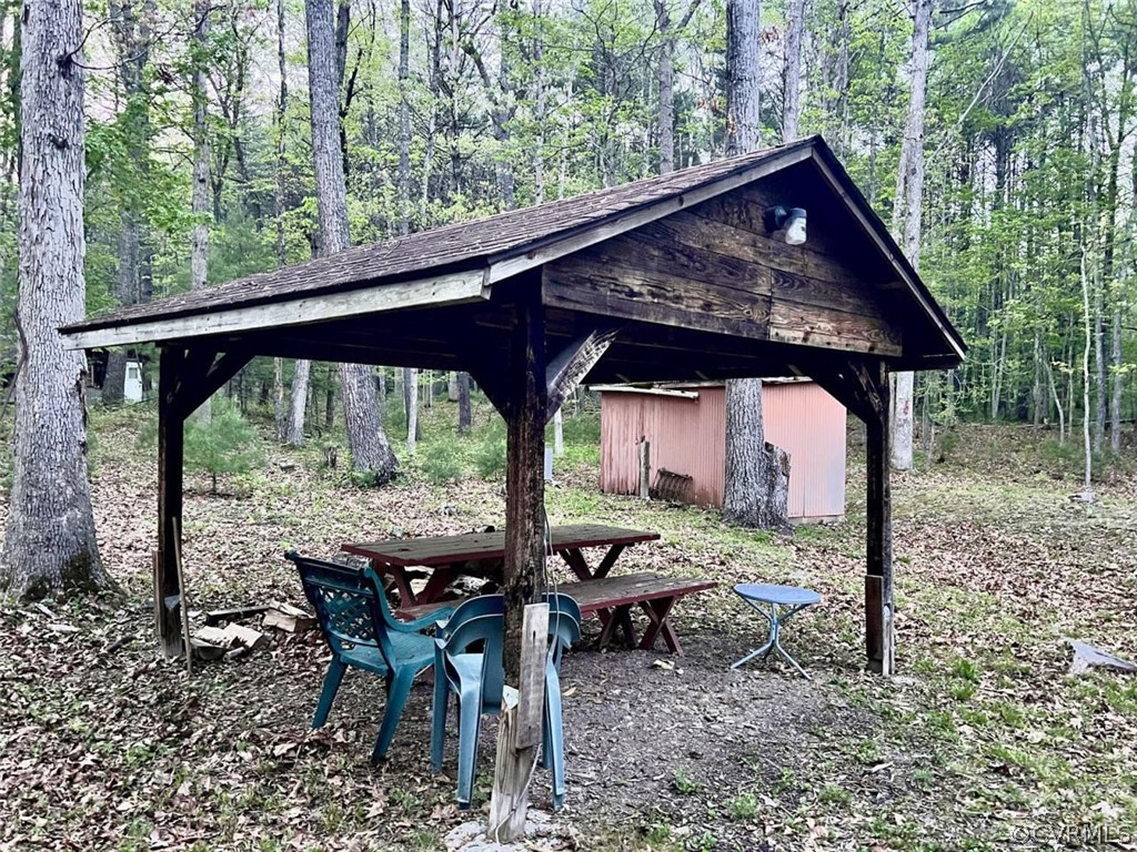1300 Braley Pond Road West Augusta, VA 24485 - Photo 7 of 23 a view of backyard with a table and chairs