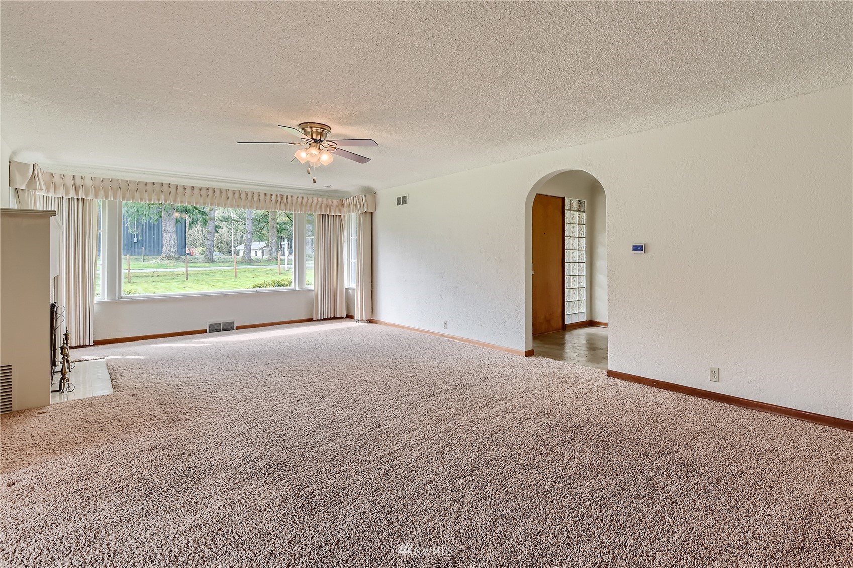 29017 Old Owen Road Monroe, WA 98272 - Photo 3 of 35 a view of an empty room with windows