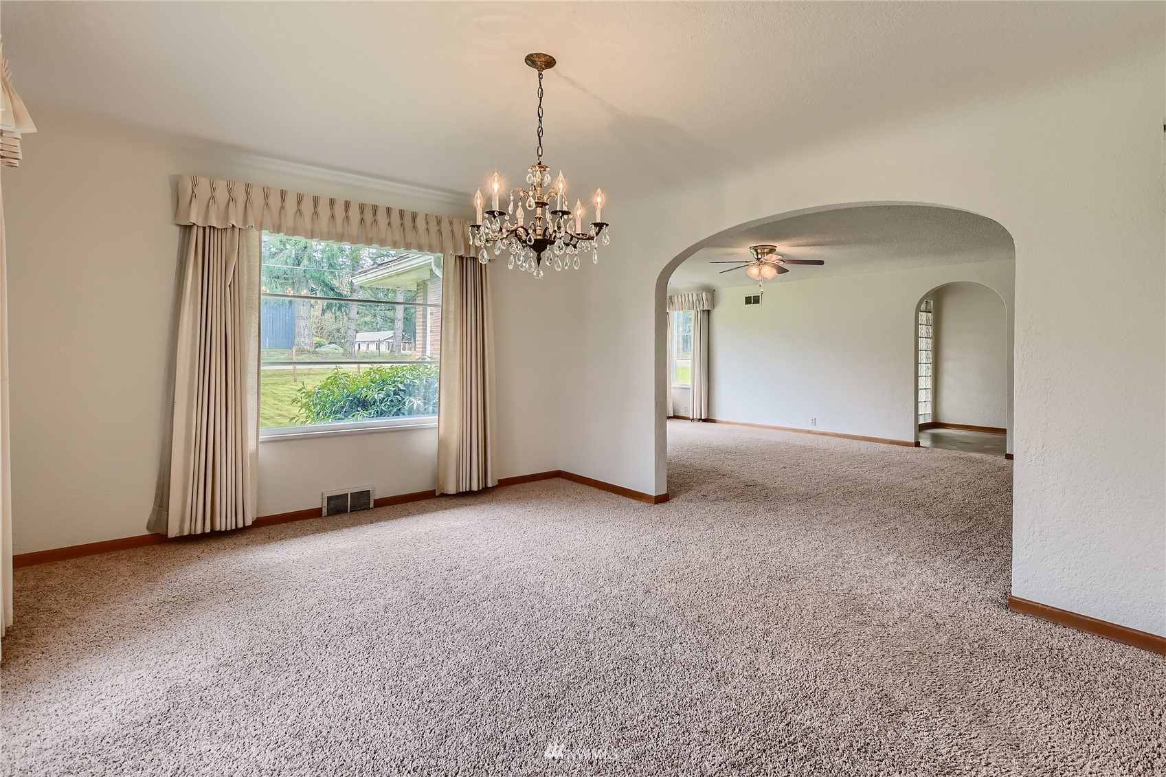 29017 Old Owen Road Monroe, WA 98272 - Photo 4 of 35 a view of a room with windows and ceiling fan