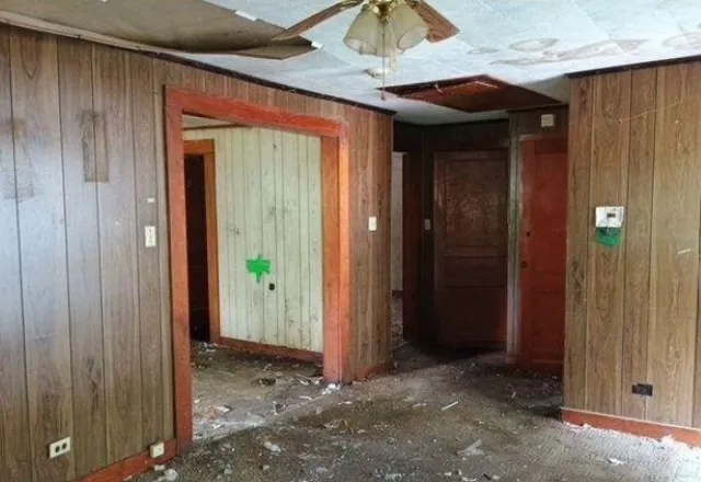 a view of a bathroom with a shower and a sink