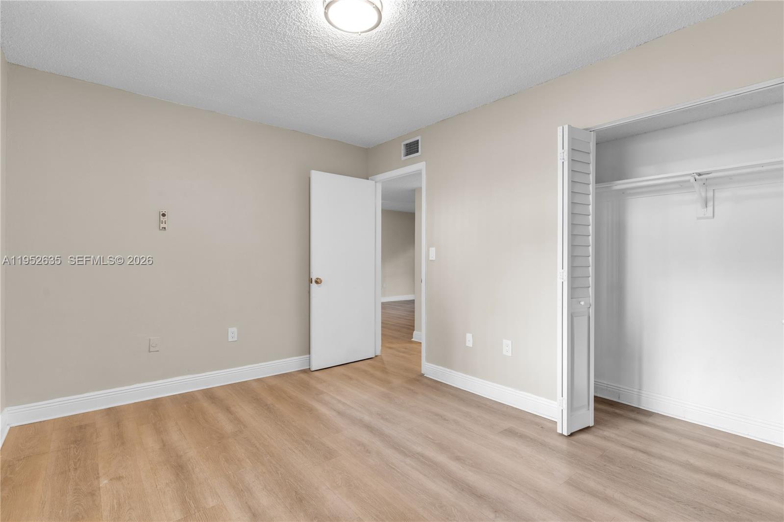 2690 West 76th Street, Unit 104 Hialeah, FL 33016 - Photo 13 of 25 a view of an empty room