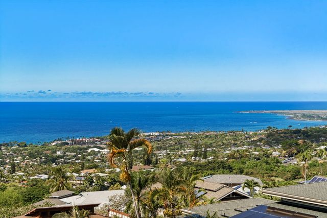 a view of a city with ocean view