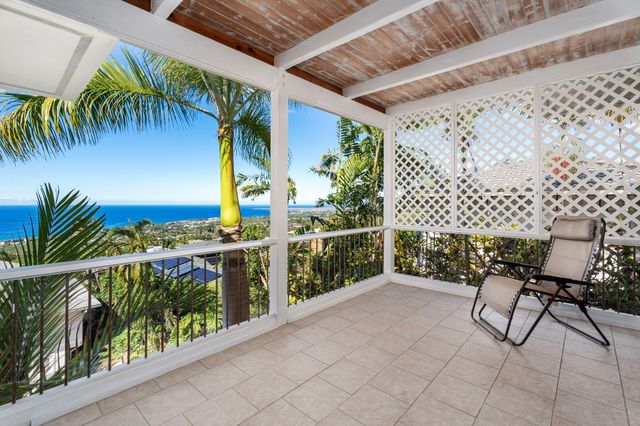 a bathroom with a sink double vanity and a mirror