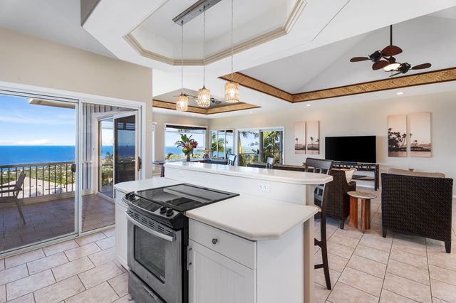 a spacious bedroom with a bed and a table