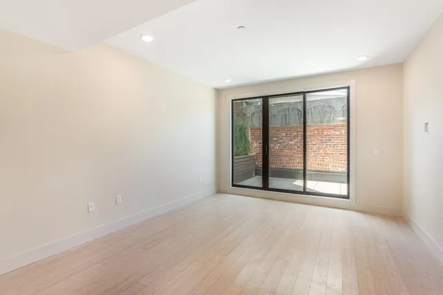 a view of kitchen with wooden floor