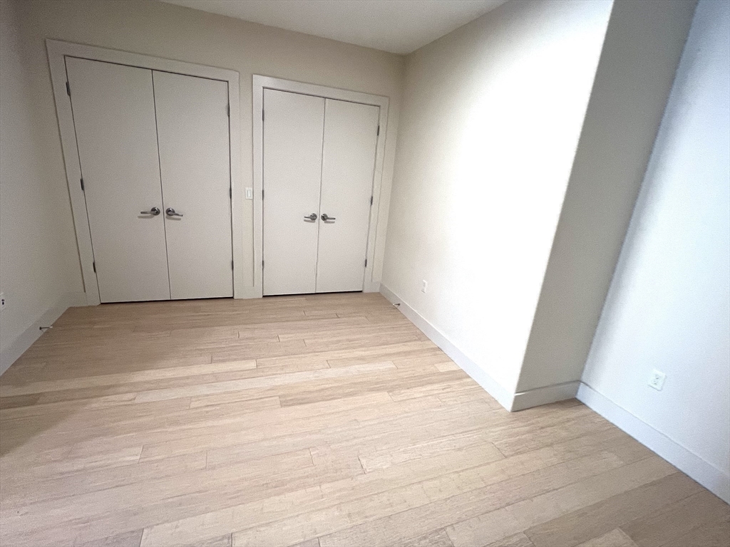 121 Portland Street, Unit 7O8 Boston, MA 02114 - Photo 10 of 40 a view of an empty room