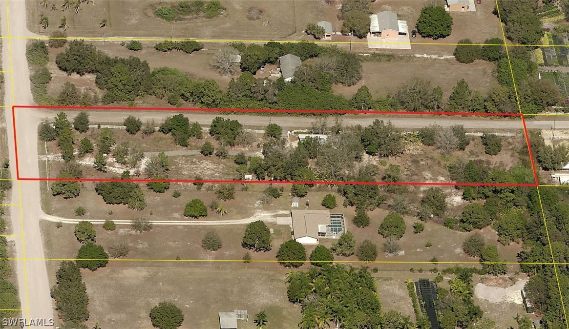 11661 Shawnee Road Fort Myers, FL 33913 - Photo 4 of 9 an aerial view of a residential houses with outdoor space