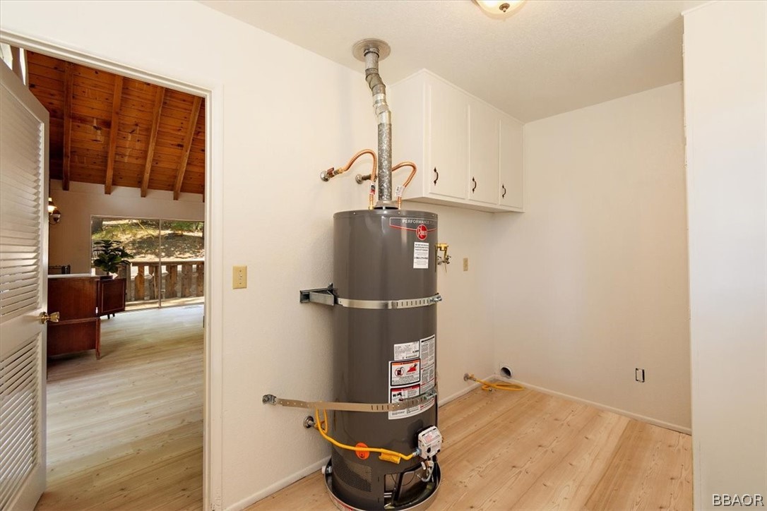 420 Lark Road Wrightwood, CA 92397 - Photo 16 of 25 a view of a room with wooden floor and furniture