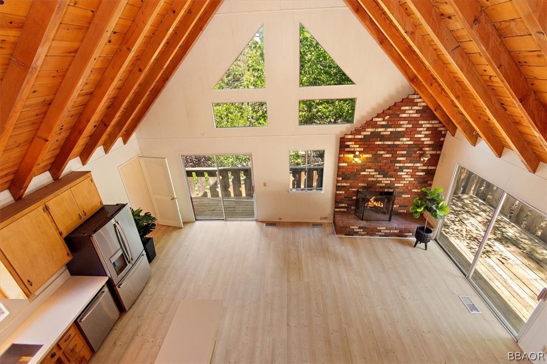 420 Lark Road Wrightwood, CA 92397 - Photo 19 of 25 a view of an entryway with wooden floor and door