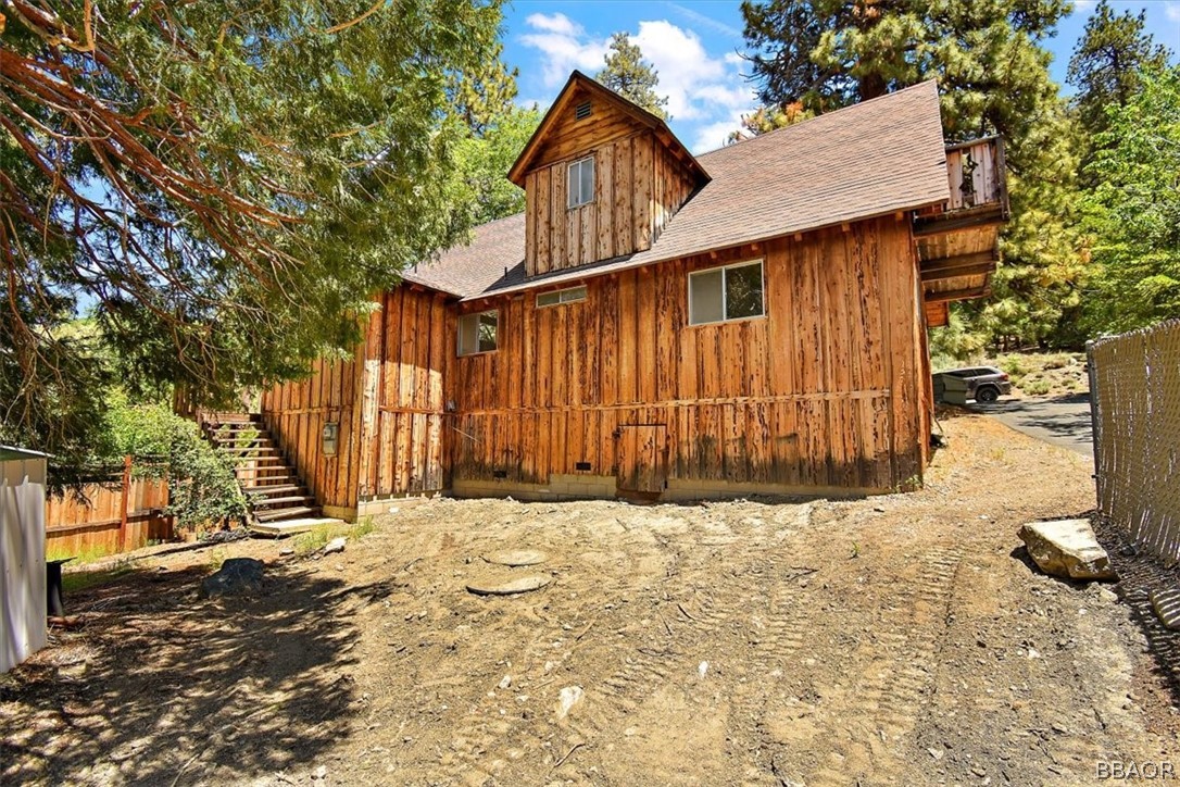 420 Lark Road Wrightwood, CA 92397 - Photo 23 of 25 a front view of a house with a yard