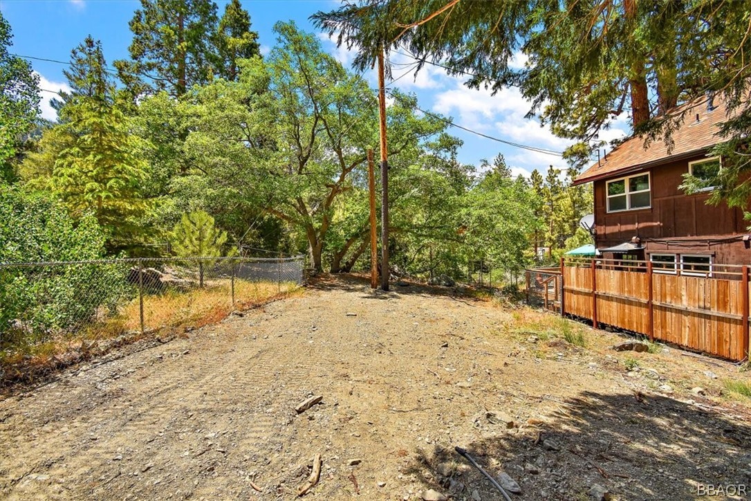 420 Lark Road Wrightwood, CA 92397 - Photo 24 of 25 a view of a yard with wooden fence