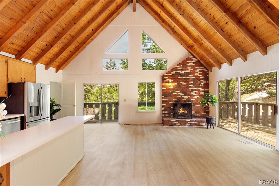 420 Lark Road Wrightwood, CA 92397 - Photo 3 of 25 a view of a patio with table and chairs and potted plants
