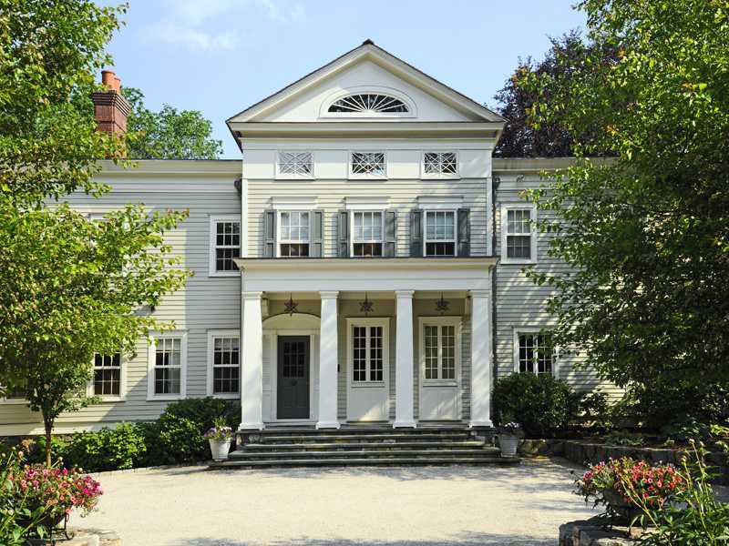 7 Calhoun Drive Greenwich, CT 06831 - Photo 20 of 24 a front view of a house