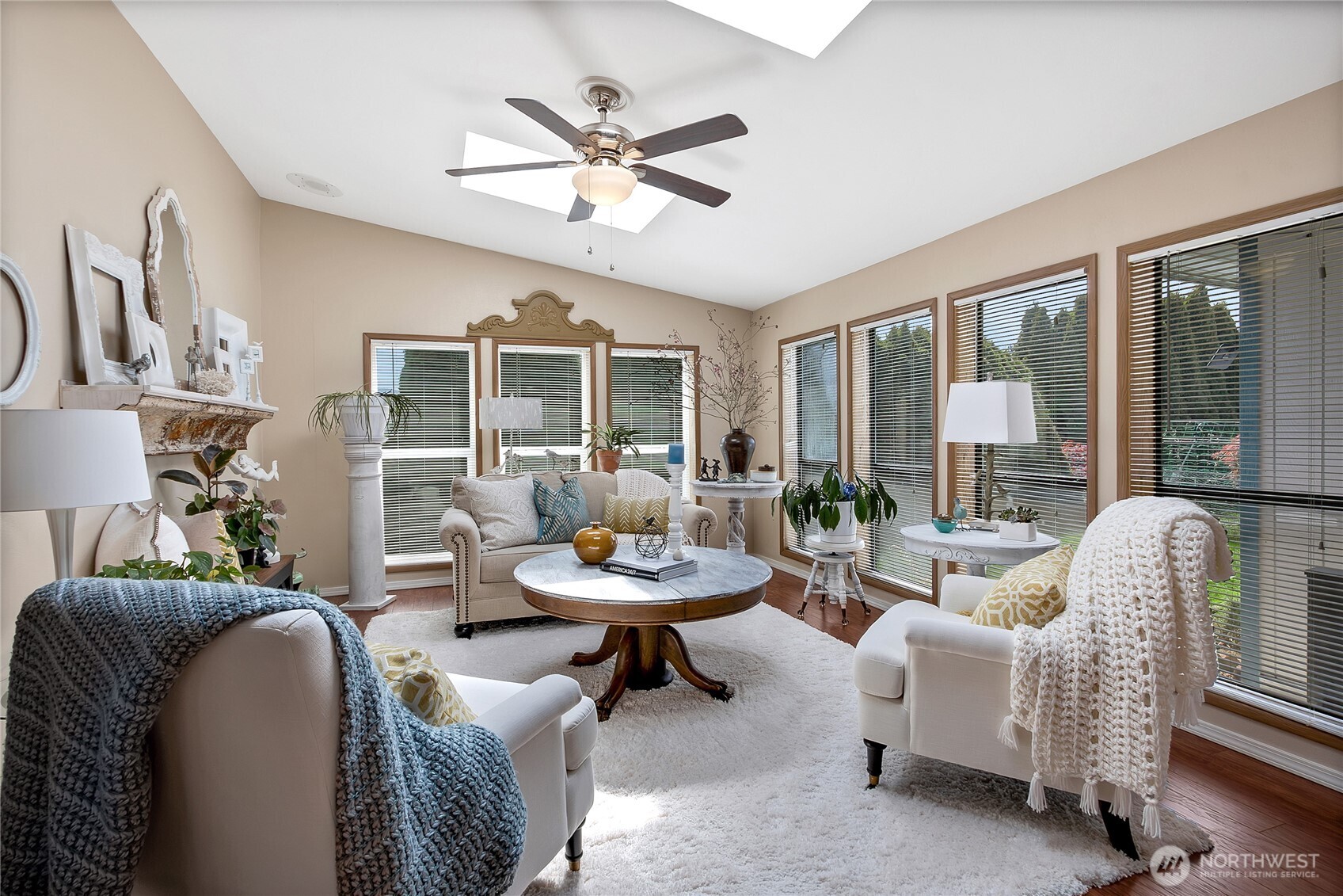 836 Harman Way South, Unit 76 Orting, WA 98360 - Photo 13 of 21 a living room with furniture and a large window