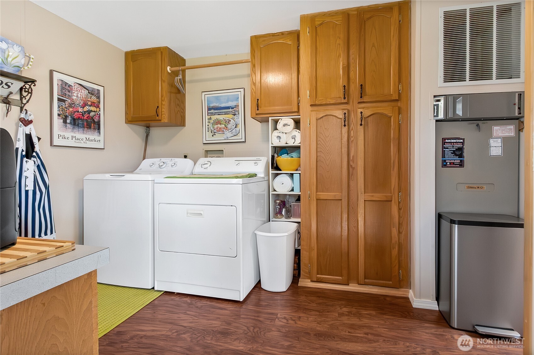 836 Harman Way South, Unit 76 Orting, WA 98360 - Photo 4 of 21 a view of a storage & utility room with two washing machine