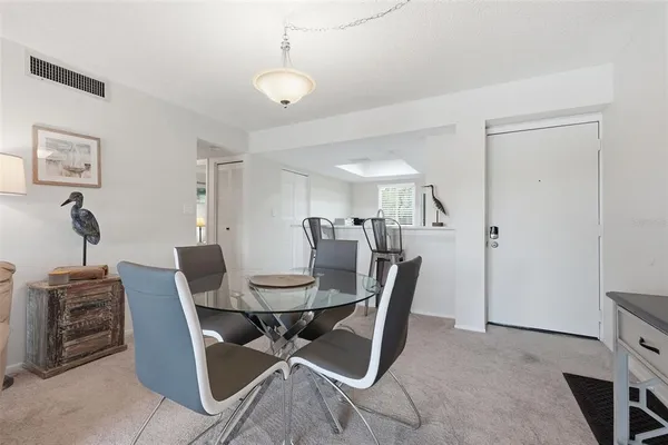 a view of a dining room with furniture
