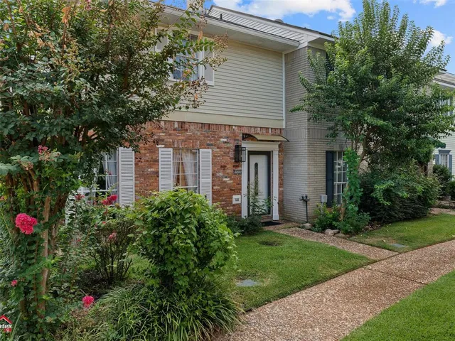 a front view of a house with porch