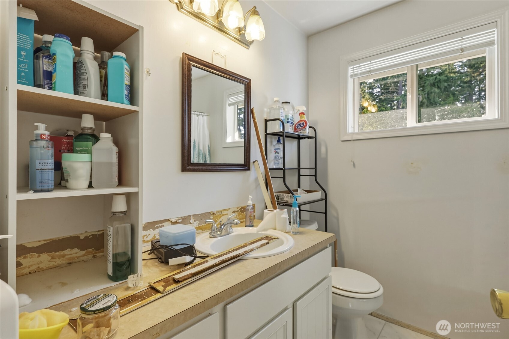 37214 Allen Road South Roy, WA 98580 - Photo 15 of 38 a bathroom with a granite countertop toilet sink and mirror