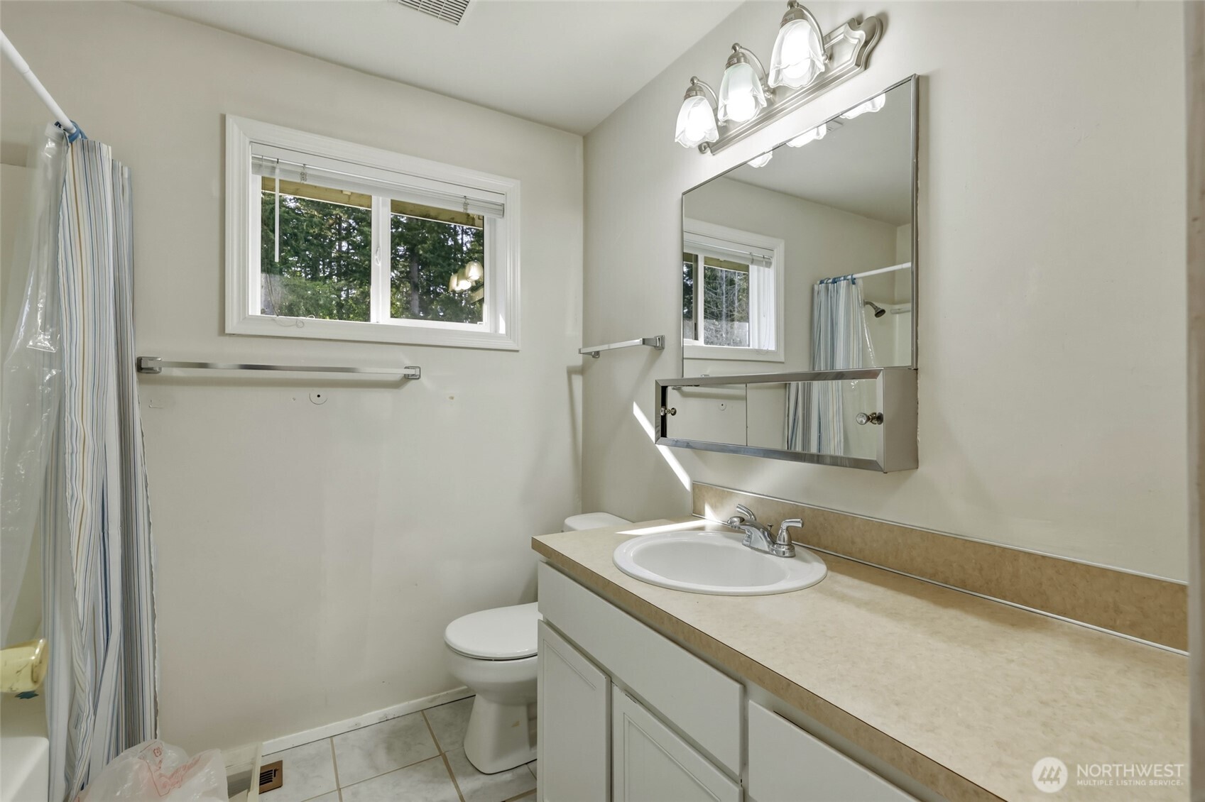 37214 Allen Road South Roy, WA 98580 - Photo 20 of 38 a bathroom with a granite countertop sink toilet and a mirror