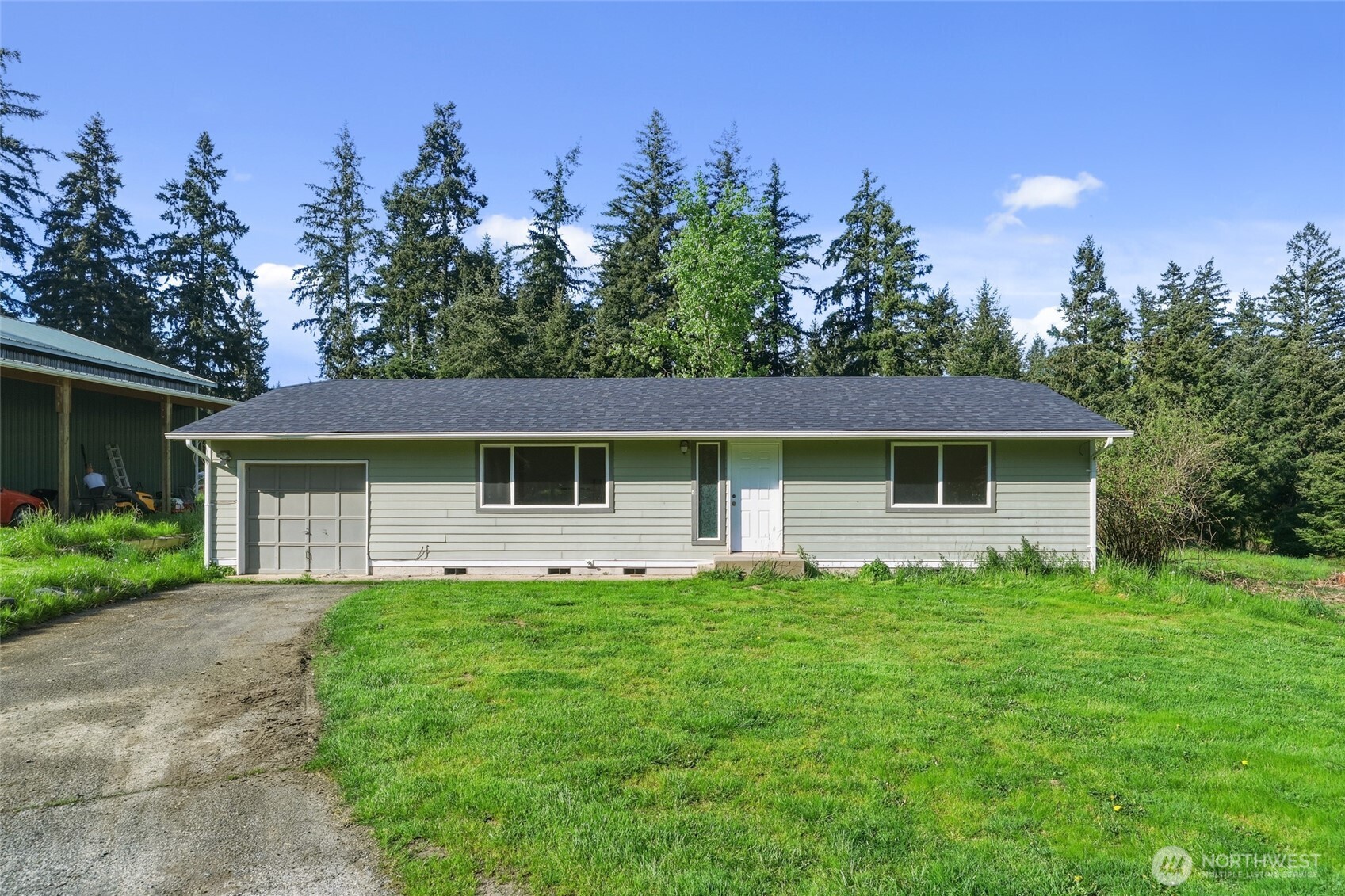 37214 Allen Road South Roy, WA 98580 - Photo 30 of 38 a view of a house with a yard